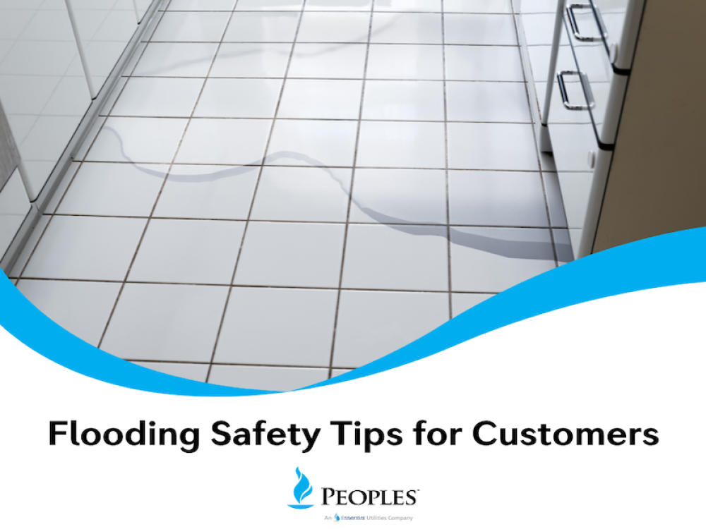 Water pooling across a tiled kitchen floor with text below that reads “Flooding Safety Tips for Customers".