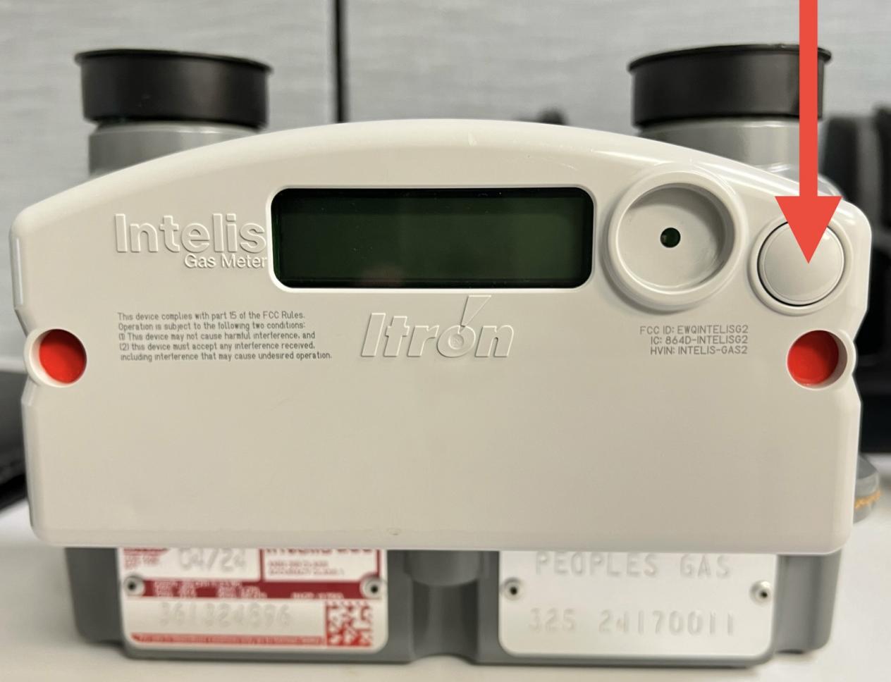 Digital natural gas meter with display screen and control button.