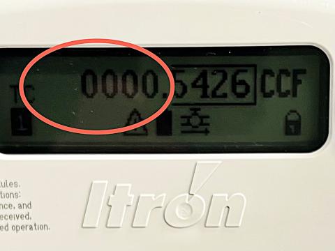 Close-up of gas meter display showing usage numbers.