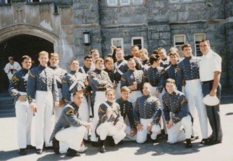 a group of soldiers in the army. John Andrews is in the middle row, 3rd from left